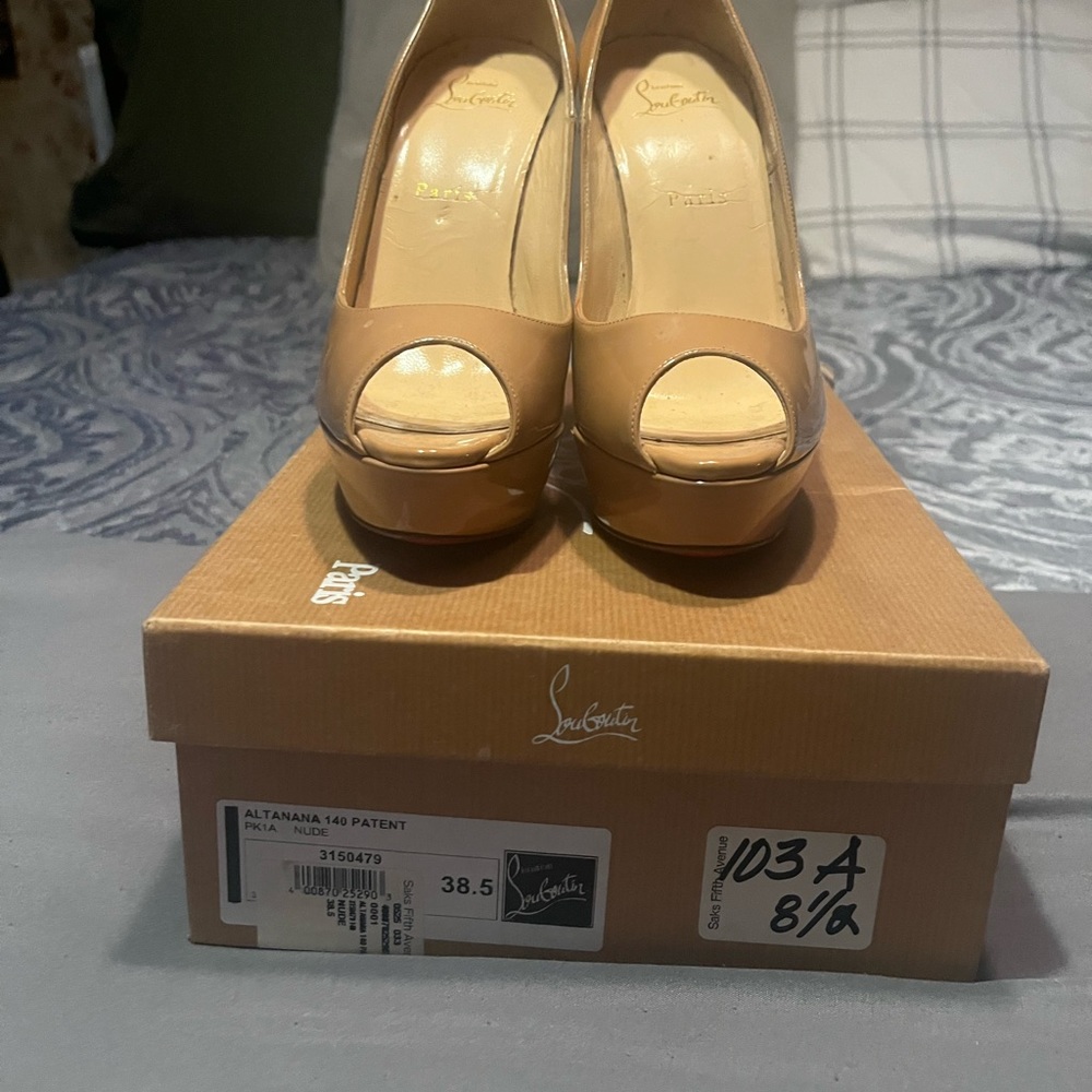 Christian louboutin nude size 38.5 worn once been sitting for many years.
